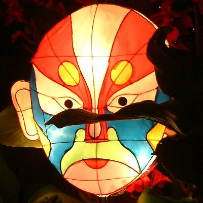 Lighted mask balloon at New Year's street festival