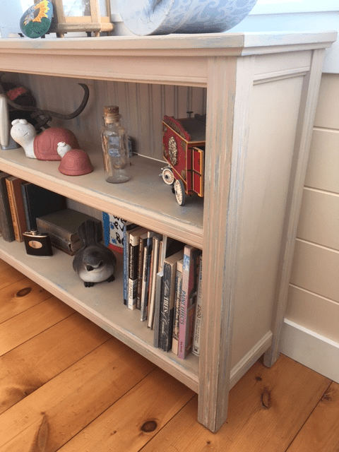 Distressed MDF bookcase looks old and well worn