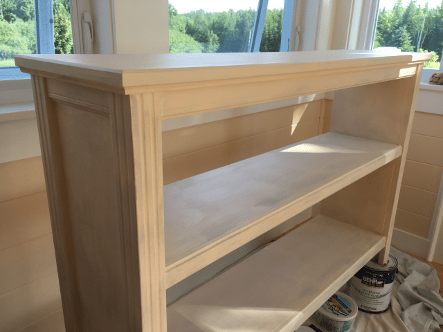Distressed finish second layer - entire bookcase given a coat of white primer